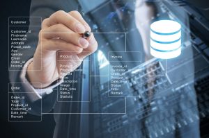 Double exposure of professional businessman system analysis design and drawing database table with futuristic background scaled 1 Data Architect Skills and Expertise