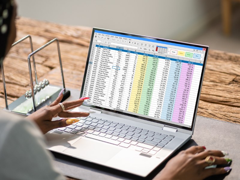 Looking at a laptop screen with a colour-coded spreadsheet